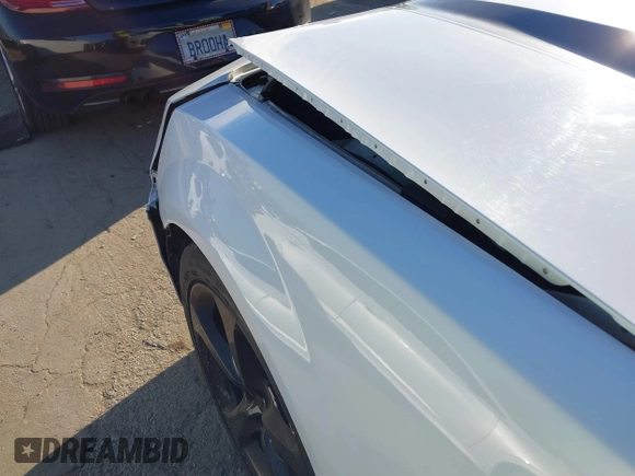 2014 Chevrolet Camaro LT z VIN 2G1FC1E39E9321549, wystawiony jako IAAI lot #41582840 z przebiegiem 129 495 mil mil oraz . Historia ofert i sprzedaży dostępna na DreamBid. Obrazek 18.