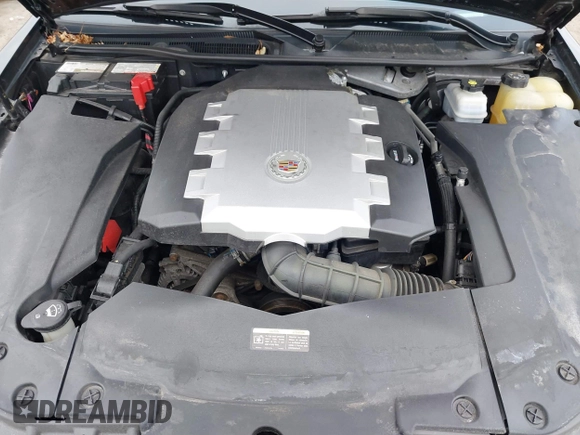 2009 Cadillac STS AWD z VIN 1G6DD67V290140111, wystawiony jako IAAI lot #41800236 z przebiegiem 81 913 mil mil oraz . Historia ofert i sprzedaży dostępna na DreamBid. Obrazek 10.