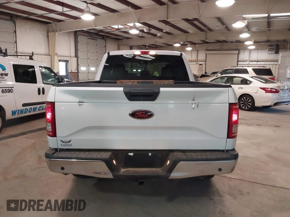 2015 Ford F-150 XL with VIN 1FTEX1CG5FKD31637, listed as a IAAI auction lot 41607827 with 201,278 mi miles. Bid and sale history available at carsss.com. Image 16.