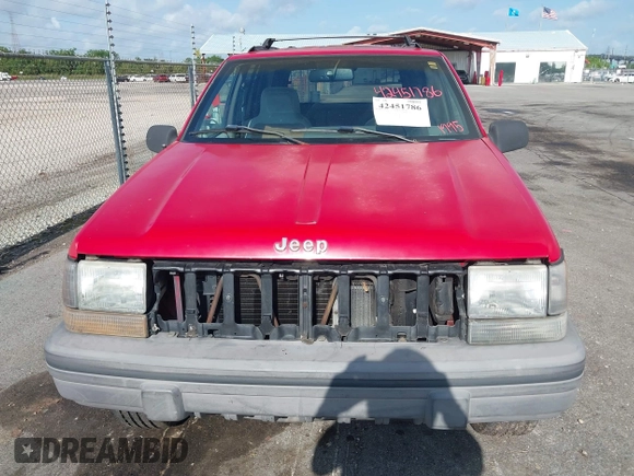 1995 Jeep Grand Cherokee Laredo with VIN 1J4FX58S9SC686074, listed as a IAAI auction lot 42451786 with 82,249 mi miles and . Bid and sale history available at DreamBid. Image 6.