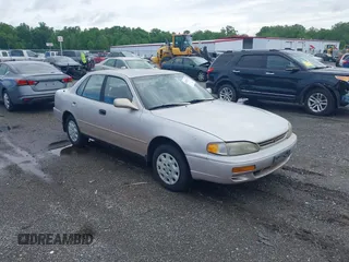 1996 Toyota Camry DX z VIN 4T1BG12K8TU754331, wystawiony jako IAAI lot #42305723 z przebiegiem 152 709 mil mil oraz . Historia ofert i sprzedaży dostępna na DreamBid. Obrazek 1.