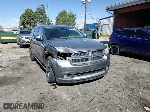 2013 Dodge Durango Crew with VIN 1C4RDJDG7DC554102, listed as a Copart auction lot 54045335 with 228,176 mi miles and Salvage Title. Bid and sale history available at DreamBid. Image 14.