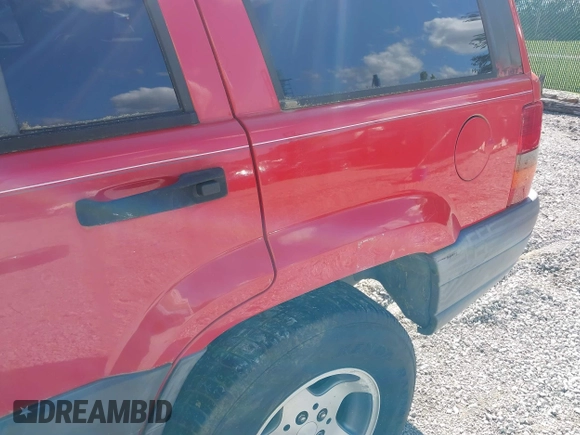 1998 Jeep Grand Cherokee Laredo with VIN 1J4FX58S9WC137514, listed as a IAAI auction lot 42305247 with 228,669 mi miles and . Bid and sale history available at DreamBid. Image 6.