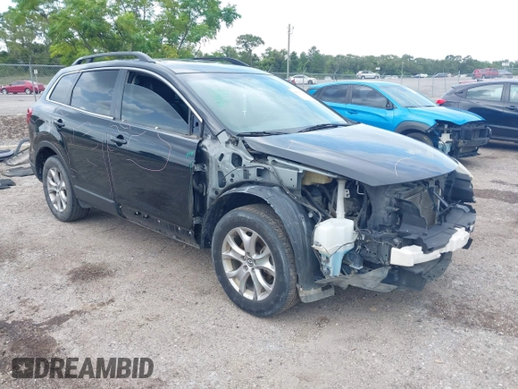 2015 Mazda CX-9 Touring with VIN JM3TB2CA4F0465730, listed as a IAAI auction lot 42512203 with 179,805 mi miles and . Bid and sale history available at DreamBid. Image 1.