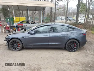 2021 Tesla Model 3 Performance with VIN 5YJ3E1EC1MF925515, listed as a IAAI auction lot 41721548 with 36,478 mi miles and . Bid and sale history available at carsss.com. Image 14.