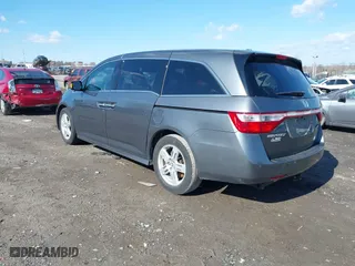 2013 Honda Odyssey Touring with VIN 5FNRL5H97DB018839, listed as a IAAI auction lot 41884016 with 171,650 mi miles. Bid and sale history available at carsss.com. Image 3.