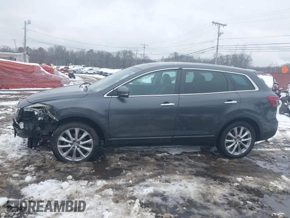 2014 Mazda CX-9 Grand Touring with VIN JM3TB3DV9E0440506, listed as a IAAI auction lot 41537718 with 217,299 mi miles and . Bid and sale history available at DreamBid. Image 14.