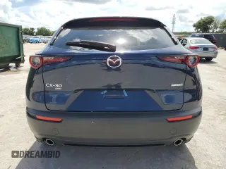 2024 Mazda CX-30 S Select Sport z VIN 3MVDMBBM6RM690587, wystawiony jako Copart lot #65265865 z przebiegiem 17 713 mil mil oraz Szkoda całkowita • Salvage title. Historia ofert i sprzedaży dostępna na DreamBid. Obrazek 6.