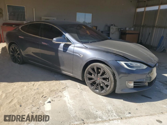 2017 Tesla Model S 60 z VIN 5YJSA1E18HF192715, wystawiony jako Copart lot #56851225 z przebiegiem 103 231 mil mil oraz Szkoda całkowita • Salvage title. Historia ofert i sprzedaży dostępna na DreamBid. Obrazek 4.