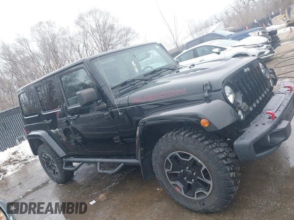 2015 Jeep Wrangler Unlimited Rubicon Hard Rock with VIN 1C4HJWFG9FL569962, listed as a IAAI auction lot 41557801 with 78,597 mi miles and . Bid and sale history available at DreamBid. Image 13.