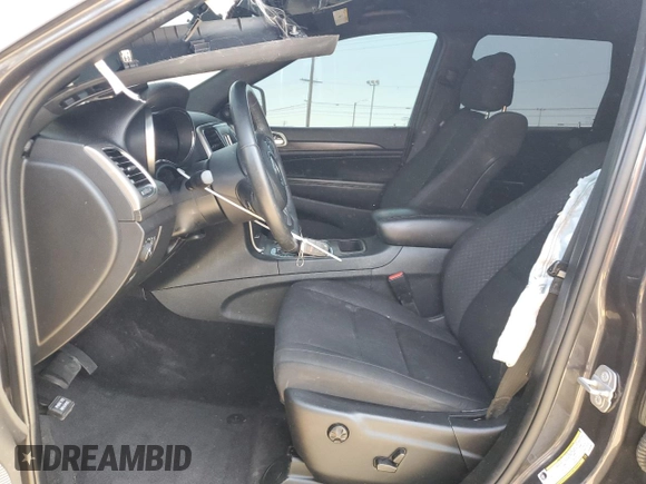 2018 Jeep Grand Cherokee Laredo E with VIN 1C4RJEAG9JC397382, listed as a Copart auction lot 56550815 with 72,239 mi miles and Salvage title. Bid and sale history available at DreamBid. Image 7.