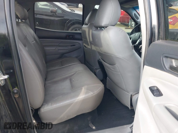 2013 Toyota Tacoma with VIN 5TFLU4EN9DX073331, listed as a IAAI auction lot 42123968 with 145,879 mi miles and . Bid and sale history available at DreamBid. Image 8.