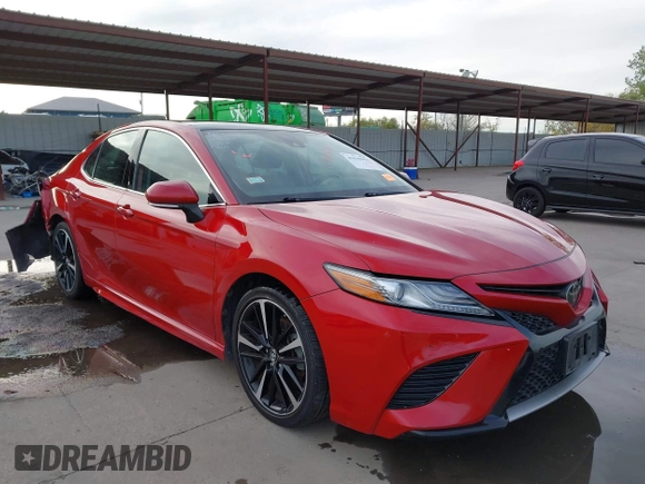 2019 Toyota Camry XSE with VIN 4T1B61HK0KU233466, listed as a IAAI auction lot 41035953 with 122,384 mi miles. Bid and sale history available at carsss.com. Image 1.