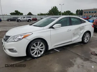 2013 Hyundai Azera z VIN KMHFH4JG6DA206540, wystawiony jako Copart lot #59350095 z przebiegiem 65 579 mil mil oraz Szkoda całkowita • Salvage title. Historia ofert i sprzedaży dostępna na DreamBid. Obrazek 1.