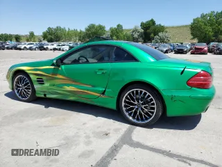 2006 Mercedes-Benz SL 500 with VIN WDBSK75F06F109541, listed as a Copart auction lot 61430545 with 106,428 mi miles and Salvage title. Bid and sale history available at DreamBid. Image 2.