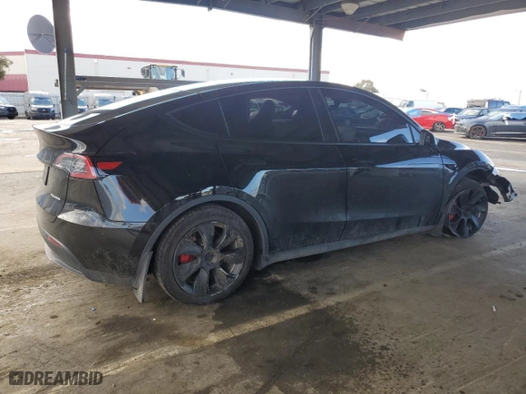 2023 Tesla Model Y Long Range with VIN 7SAYGDEE3PF938230, listed as a Copart auction lot 47883385 with 28,461 mi miles and Salvage Title. Bid and sale history available at carsss.com. Image 3.