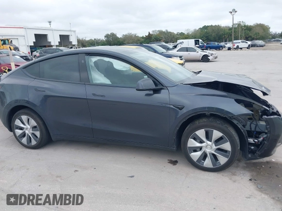 2024 Tesla Model Y with VIN 7SAYGDED3RF002246, listed as a IAAI auction lot 41566184 with 10,316 mi miles and . Bid and sale history available at DreamBid. Image 12.