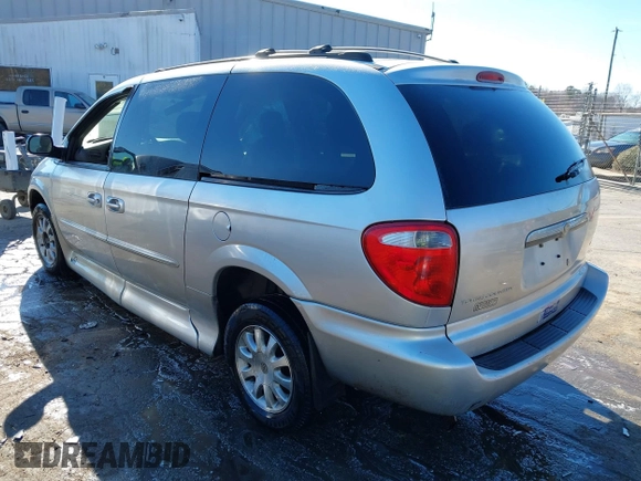 2003 Chrysler Town & Country EX with VIN 2C4GP74L83R212596, listed as a IAAI auction lot 41335410 with Not Provided miles and . Bid and sale history available at carsss.com. Image 3.