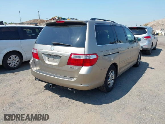 2005 Honda Odyssey EX-L with VIN 5FNRL38755B107829, listed as a IAAI auction lot 42422225 with 227,008 mi miles and . Bid and sale history available at DreamBid. Image 4.