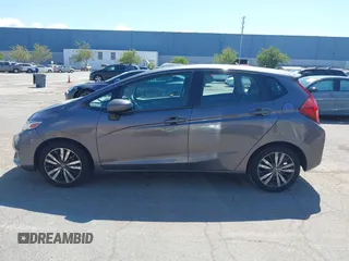 2015 Honda Fit EX-L z VIN 3HGGK5H86FM746265, wystawiony jako IAAI lot #42253205 z przebiegiem 75 491 mil mil oraz . Historia ofert i sprzedaży dostępna na DreamBid. Obrazek 14.