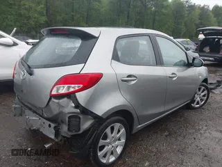 2011 Mazda 2 Sport with VIN JM1DE1HY1B0127409, listed as a IAAI auction lot 42015727 with 154,385 mi miles. Bid and sale history available at carsss.com. Image 4.