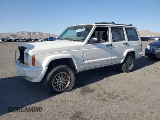 1997 Jeep Cherokee z VIN 1J4FT78SXVL566876, wystawiony jako Copart lot #78181874 z przebiegiem 199 156 mil mil oraz Szkoda całkowita • Salvage title. Historia ofert i sprzedaży dostępna na DreamBid. Obrazek 1.