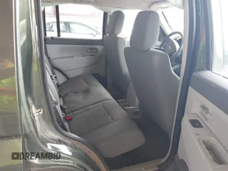 2008 Jeep Liberty Sport with VIN 1J8GN28K98W232003, listed as a IAAI auction lot 42127476 with 129,286 mi miles. Bid and sale history available at carsss.com. Image 8.