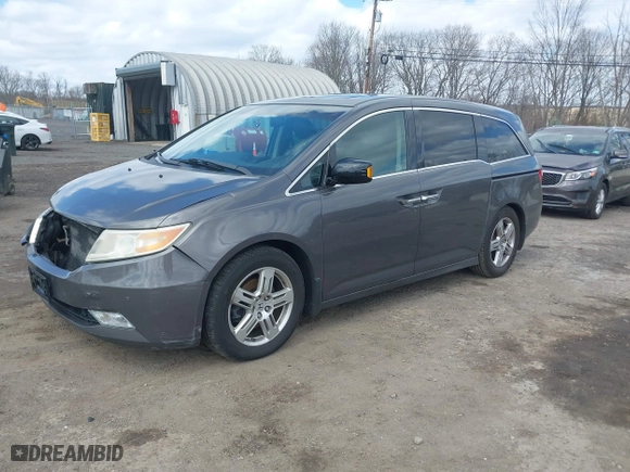2012 Honda Odyssey Touring with VIN 5FNRL5H96CB071255, listed as a IAAI auction lot 41959312 with 167,620 mi miles. Bid and sale history available at carsss.com. Image 19.