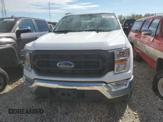 2021 Ford F-150 XL with VIN 1FTMF1EB4MKE11721, listed as a Copart auction lot 65990284 with Not provided miles and Salvage title. Bid and sale history available at DreamBid. Image 5.