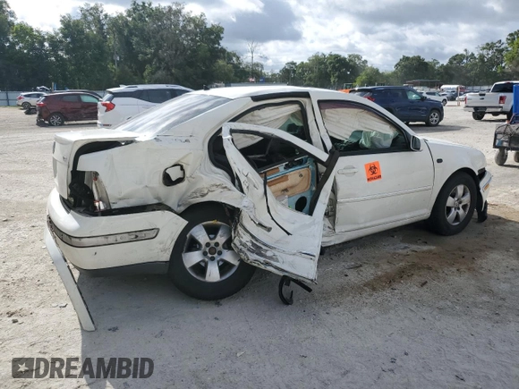 2004 Volkswagen Jetta GLS с VIN 3VWSR69M14M143742, выставлен на аукционе Copart как лот 62860135 с пробегом 322 904 миль миль и Списание • Salvage title. История ставок и продаж доступна на DreamBid. Изображение 3.