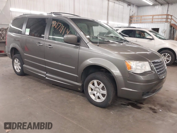 2010 Chrysler Town & Country Touring Plus with VIN 2A4RR8D17AR393916, listed as a IAAI auction lot 42171114 with 123,741 mi miles. Bid and sale history available at carsss.com. Image 1.