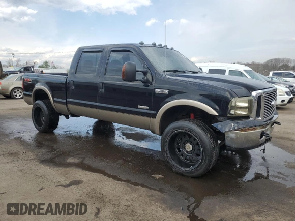 2005 Ford F-350 XL with VIN 1FTWW31P05EC09657, listed as a Copart auction lot 51969665 with 158,206 mi miles and Salvage Title. Bid and sale history available at DreamBid. Image 4.
