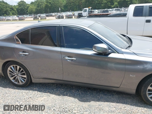 2019 Infiniti Q50 Luxe z VIN JN1EV7APXKM519048, wystawiony jako IAAI lot #42767526 z przebiegiem 99 705 mil mil oraz . Historia ofert i sprzedaży dostępna na DreamBid. Obrazek 13.