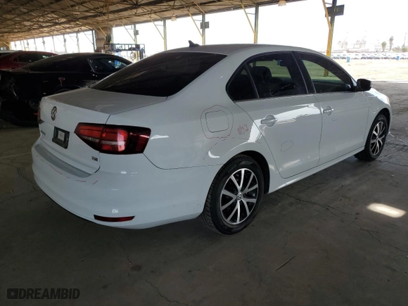 2018 Volkswagen Jetta 1.4T SE with VIN 3VWDB7AJ1JM217709, listed as a Copart auction lot 50658165 with 84,972 mi miles and Salvage Title. Bid and sale history available at carsss.com. Image 3.