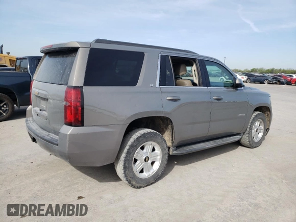 2019 Chevrolet Tahoe LT z VIN 1GNSCBKC8KR396364, wystawiony jako Copart lot #49660755 z przebiegiem 129 014 mil mil oraz Szkoda całkowita • Salvage title. Historia ofert i sprzedaży dostępna na DreamBid. Obrazek 3.