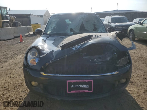 2009 MINI Hardtop S with VIN WMWMF73599TT94509, listed as a Copart auction lot 53495645 with Not provided miles and Salvage title. Bid and sale history available at DreamBid. Image 5.