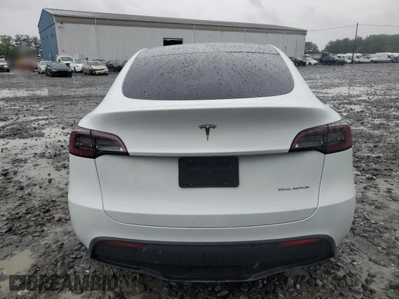 2024 Tesla Model Y Long Range с VIN 7SAYGDEE3RA283311, выставлен на аукционе Copart как лот 56925505 с пробегом Не указан миль и Списание • Salvage title. История ставок и продаж доступна на DreamBid. Изображение 6.