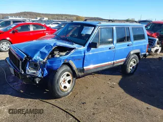 1996 Jeep Cherokee Sport with VIN 1J4FJ68S6TL171428, listed as a IAAI auction lot 40881632 with 323,289 mi miles. Bid and sale history available at carsss.com. Image 17.