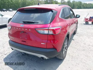 2020 Ford Escape Titanium z VIN 1FMCU9J92LUA39457, wystawiony jako IAAI lot #42222441 z przebiegiem 107 148 mil mil oraz . Historia ofert i sprzedaży dostępna na DreamBid. Obrazek 4.