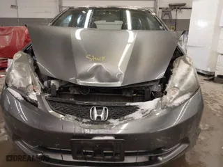 2013 Honda Fit with VIN JHMGE8H34DC075946, listed as a IAAI auction lot 41512409 with 125,105 mi miles. Bid and sale history available at carsss.com. Image 6.