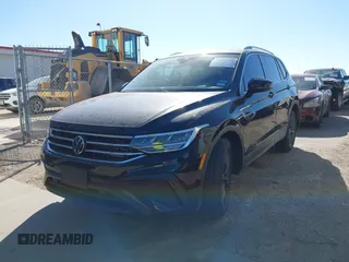 2023 Volkswagen Tiguan SE with VIN 3VV3B7AX3PM085470, listed as a IAAI auction lot 41731153 with 14,911 mi miles and . Bid and sale history available at DreamBid. Image 2.
