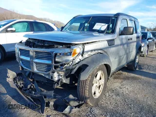 2007 Dodge Nitro SXT with VIN 1D8GU28K67W740794, listed as a IAAI auction lot 41591855 with 162,709 mi miles. Bid and sale history available at carsss.com. Image 6.