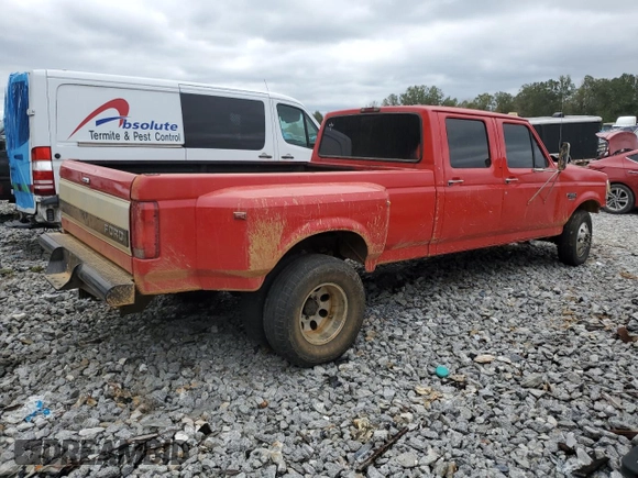 1996 Ford F-350 with VIN 1FTJW35F3TEB59586, listed as a Copart auction lot 79329304 with 199,054 mi miles and Salvage title. Bid and sale history available at DreamBid. Image 3.