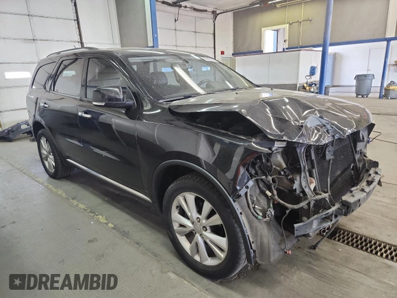 2013 Dodge Durango Crew z VIN 1C4RDJDGXDC672239, wystawiony jako Copart lot #59227905 z przebiegiem 167 982 mil mil oraz Szkoda całkowita • Salvage title. Historia ofert i sprzedaży dostępna na DreamBid. Obrazek 4.