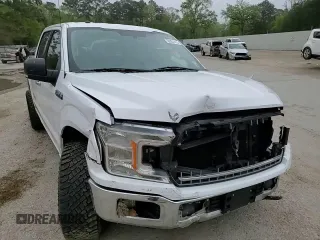2018 Ford F-150 XL with VIN 1FTEW1C53JKC18828, listed as a Copart auction lot 50357415 with 128,689 mi miles and Salvage Title. Bid and sale history available at DreamBid. Image 10.
