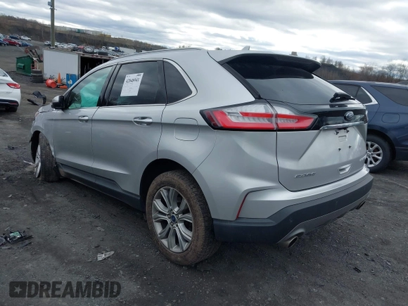 2019 Ford Edge Titanium with VIN 2FMPK4K95KBB55619, listed as a IAAI auction lot 42048941 with 89,999 mi miles. Bid and sale history available at carsss.com. Image 3.