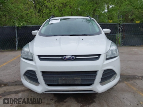 2016 Ford Escape SE with VIN 1FMCU9GX1GUC04085, listed as a IAAI auction lot 42126826 with 130,728 mi miles. Bid and sale history available at carsss.com. Image 12.