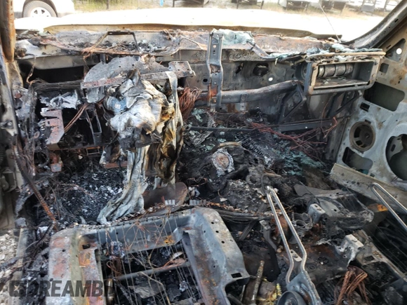 2003 Chevrolet Silverado 1500HD LS z VIN 1GCGK13UX3F142788, wystawiony jako Copart lot #74943634 z przebiegiem Nie podano mil oraz Szkoda całkowita • Salvage title. Historia ofert i sprzedaży dostępna na DreamBid. Obrazek 8.