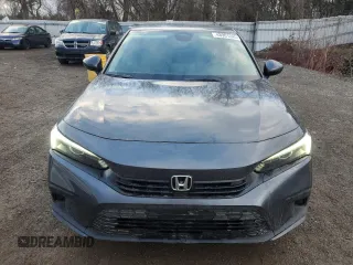 2022 Honda Civic LX z VIN 2HGFE2F21NH103335, wystawiony jako Copart lot #48901245 z przebiegiem 87 844 mil mil oraz Czysty tytuł • Clean title. Historia ofert i sprzedaży dostępna na DreamBid. Obrazek 5.