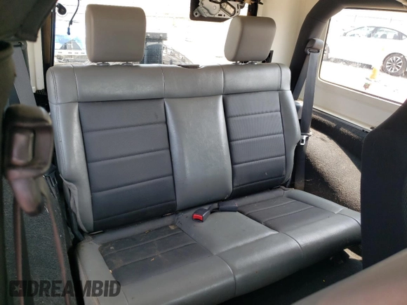 2009 Jeep Wrangler X с VIN 1J4FA241X9L725231, выставлен на аукционе Copart как лот 60408605 с пробегом 233 218 миль миль и Чистый • Clean title. История ставок и продаж доступна на DreamBid. Изображение 11.